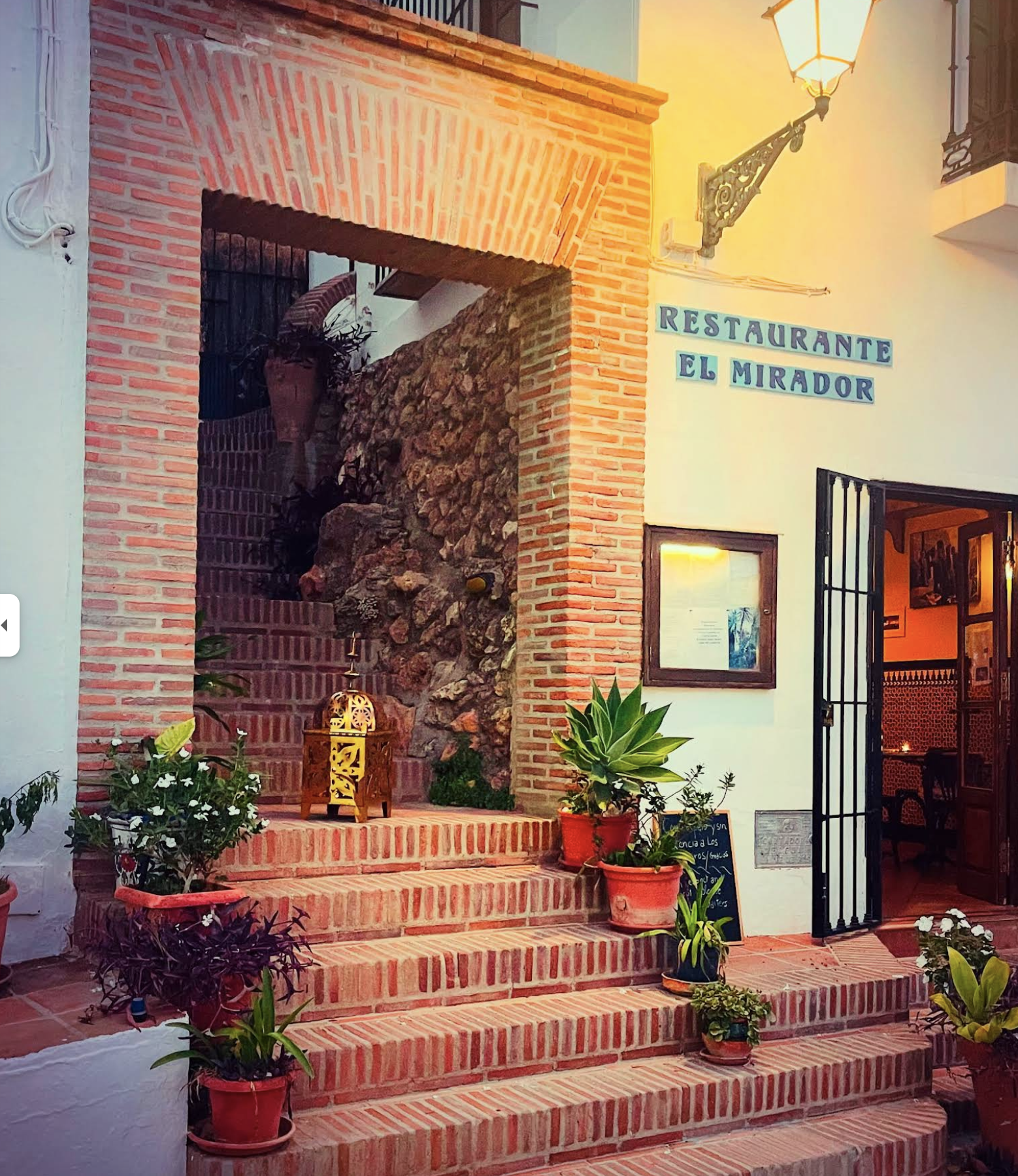Entrance archway of Restaurante El Mirador in Frigiliana