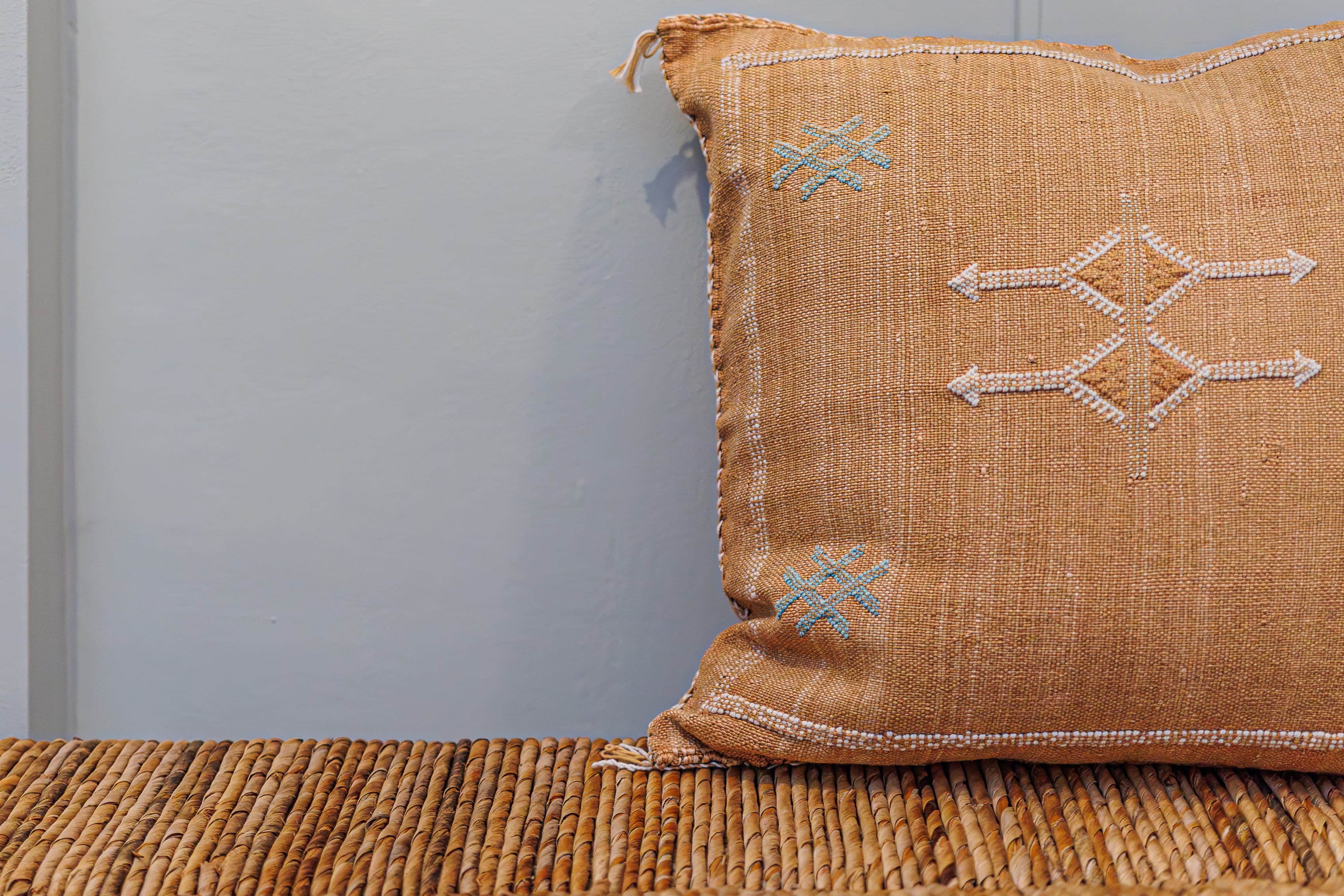Close-up of a woven cushion and textile detail